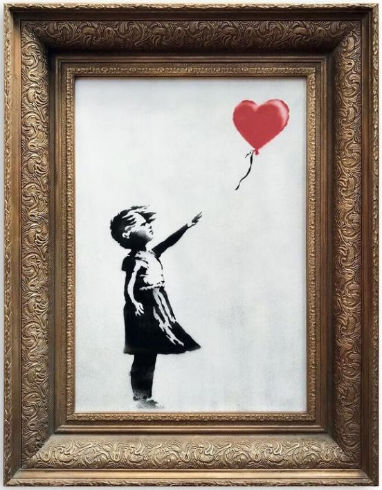 Expertos en arte creen que el valor de “La niña con el globo” de Banksy que este fin de semana se autodestruyó tras ser vendida por 1,2 millones de dólares podría haber duplicado su precio tras pasar por la trituradora. (Foto: AFP Photo/HO)